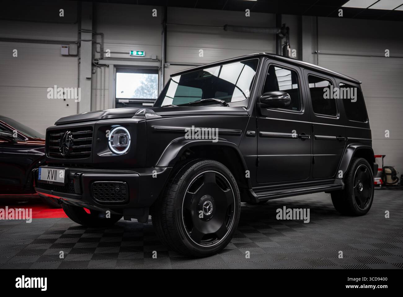 Matte Black Mercedes AMG G Class SUV in Indoor Showroom Setting Stock ...