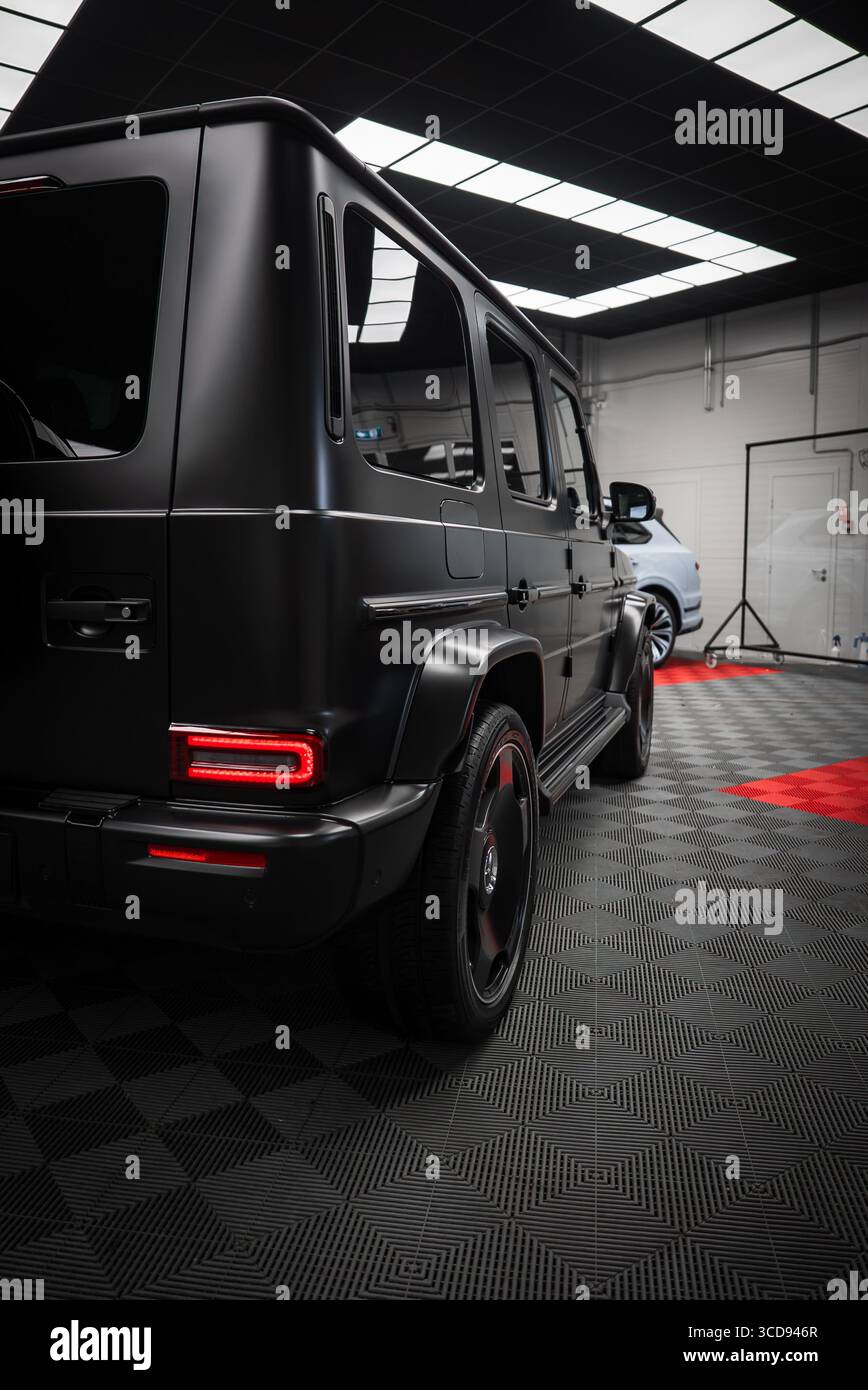 Matte Black Mercedes AMG G Class SUV in Indoor Showroom Setting Stock ...