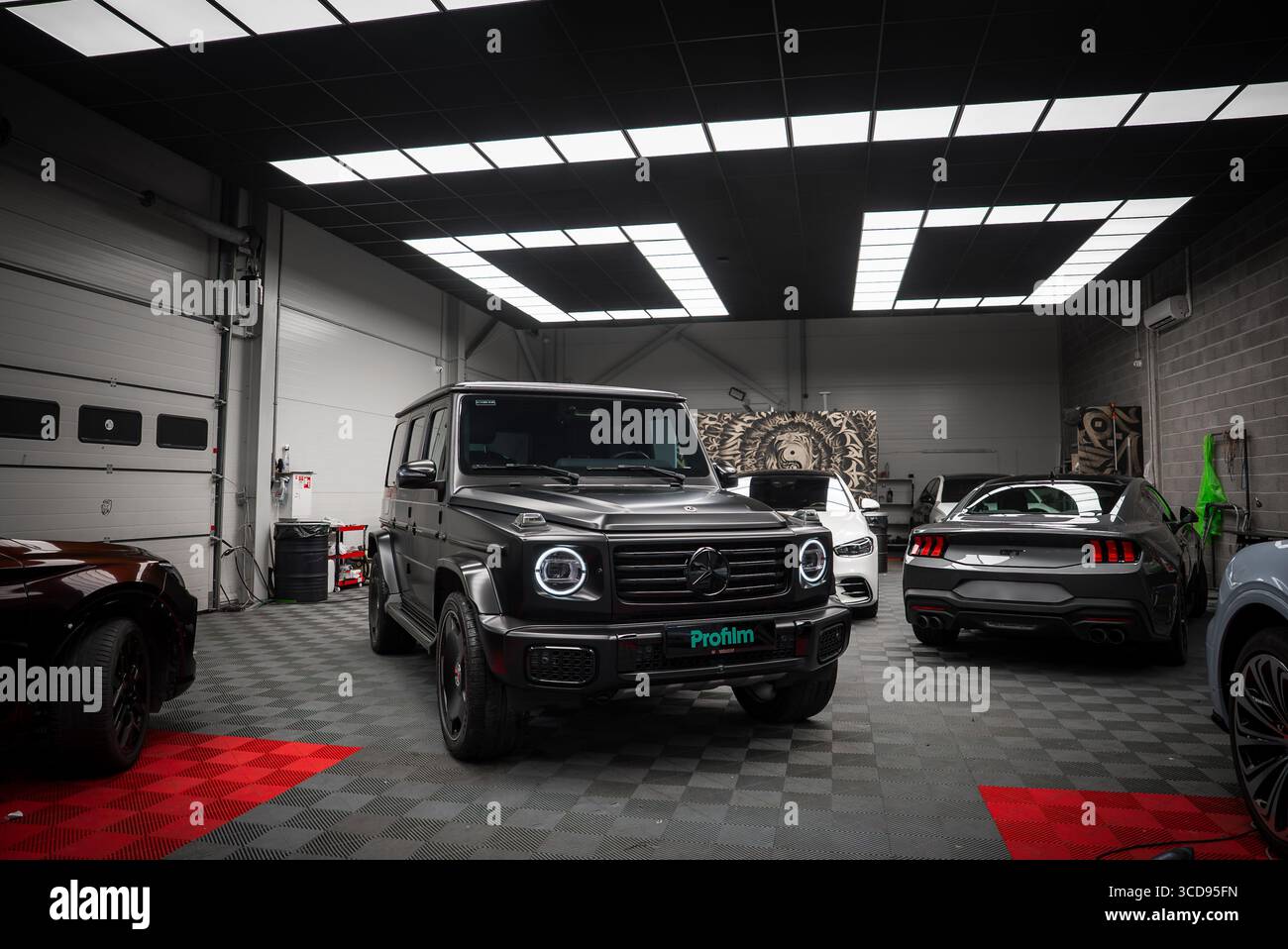 Mercedes AMG G Class and Ford Mustang GT 5.0 in Modern Garage Stock ...