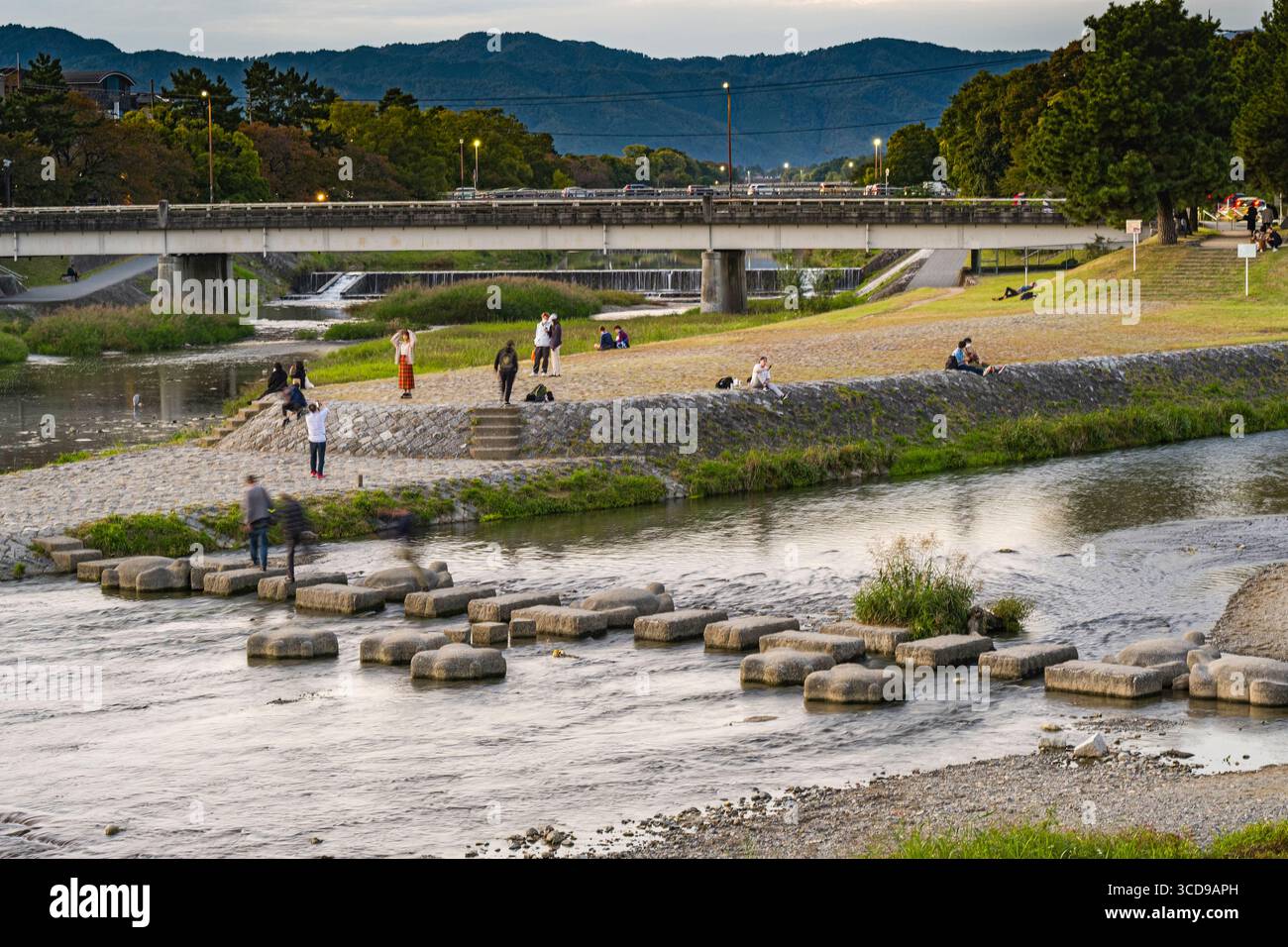 Concrete stepping stones in the Takano River at the Kamogawa Delta, Shimogamo Miyakawacho, Sakyo Ward, Kyoto, Kansai, Honshu, Japan Stock Photo