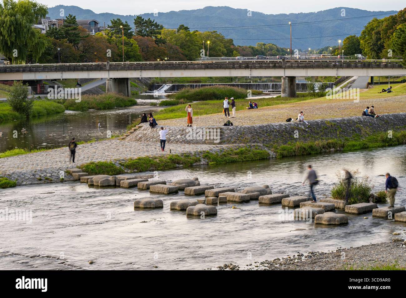 Concrete stepping stones in the Takano River at the Kamogawa Delta, Shimogamo Miyakawacho, Sakyo Ward, Kyoto, Kansai, Honshu, Japan Stock Photo