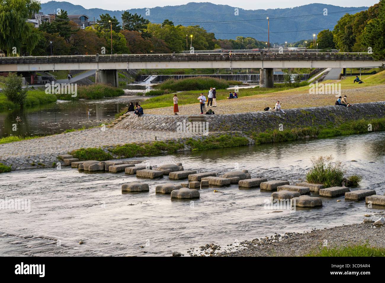 Concrete stepping stones in the Takano River at the Kamogawa Delta, Shimogamo Miyakawacho, Sakyo Ward, Kyoto, Kansai, Honshu, Japan Stock Photo