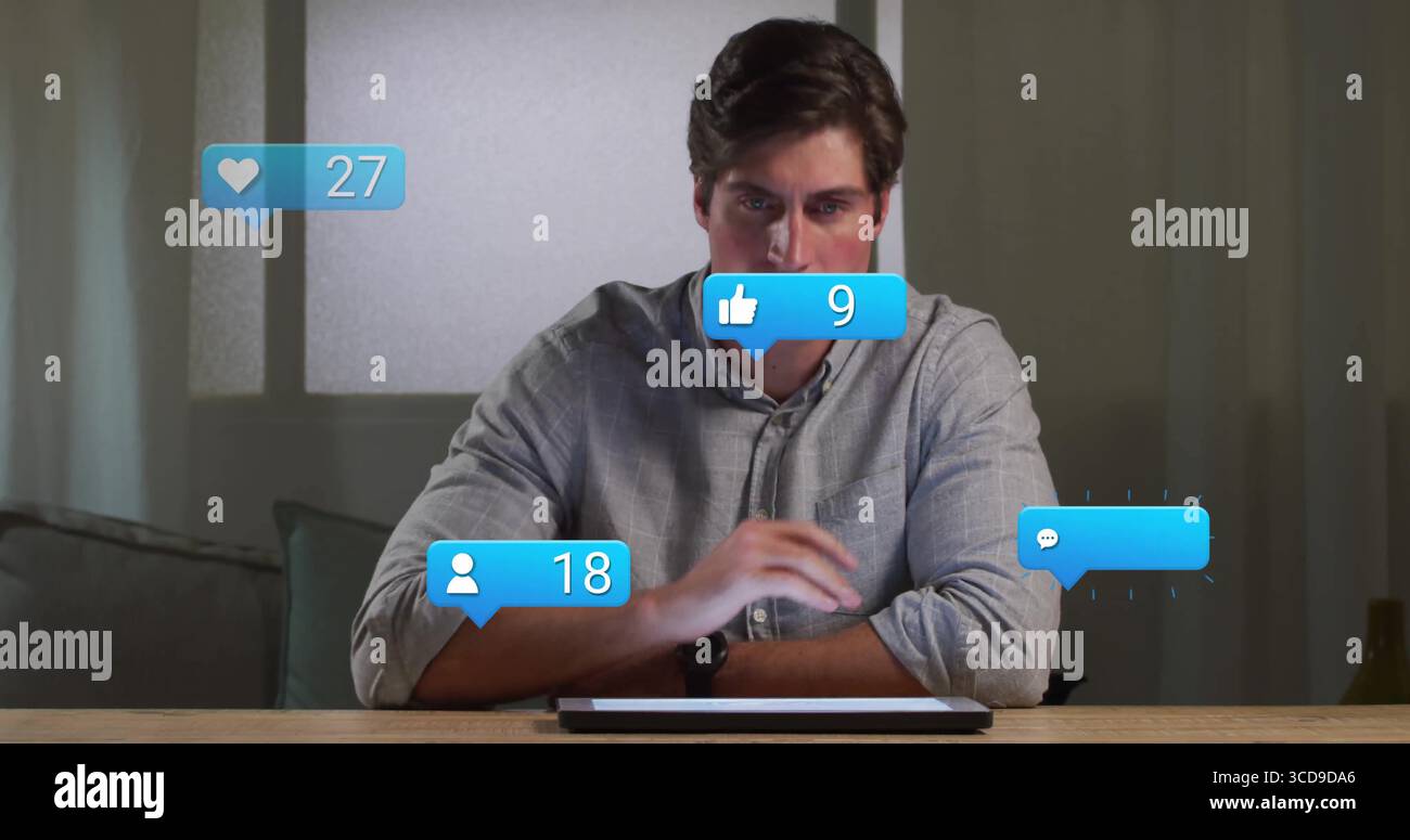 Man tapping tablet in dim hi-res stock photography and images - Alamy