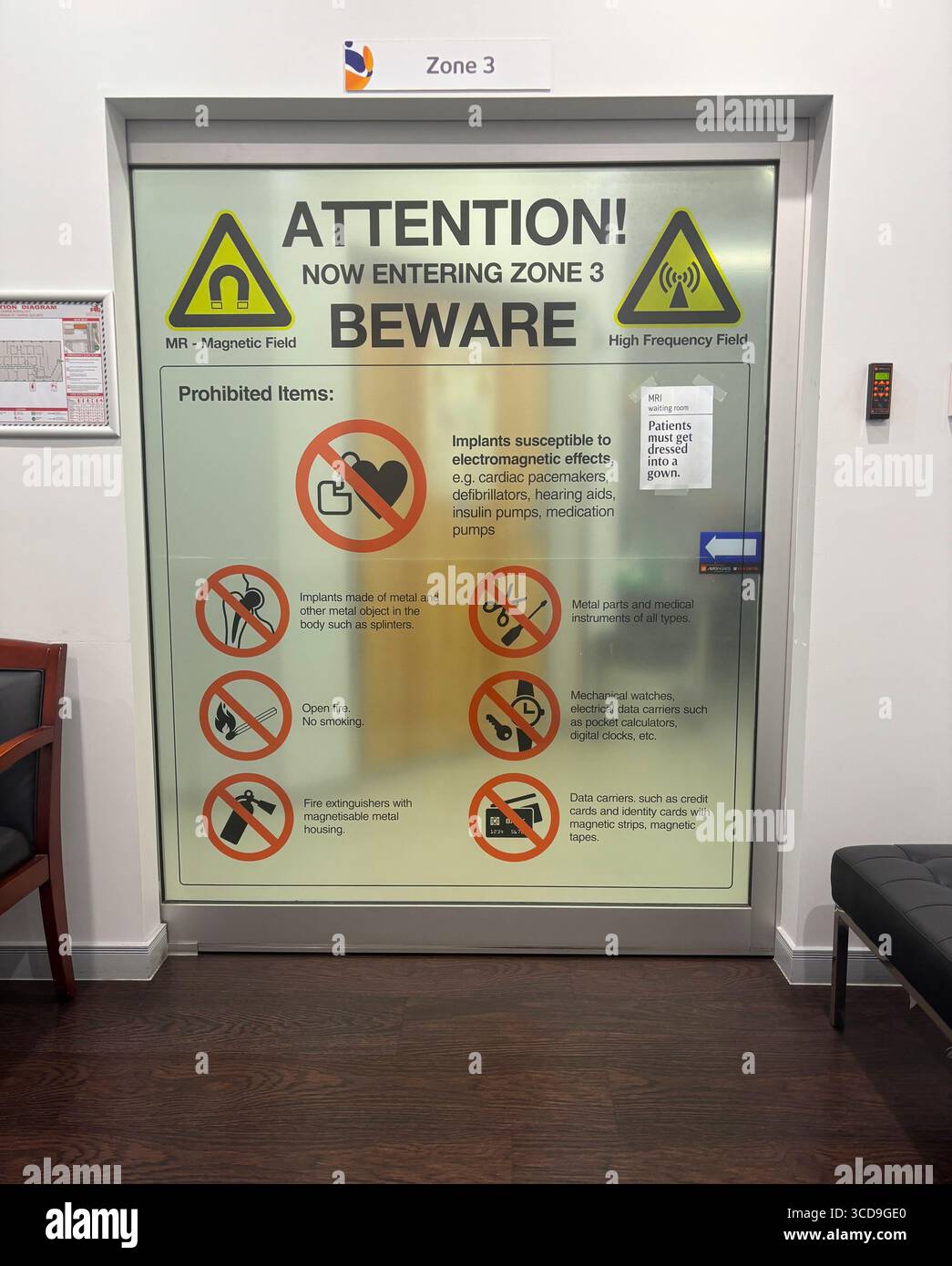 Zone 3 door at a Magnetic Resonance Imaging laboratory warning of high frequency magnetic fields - Smartphone Captured Stock Image