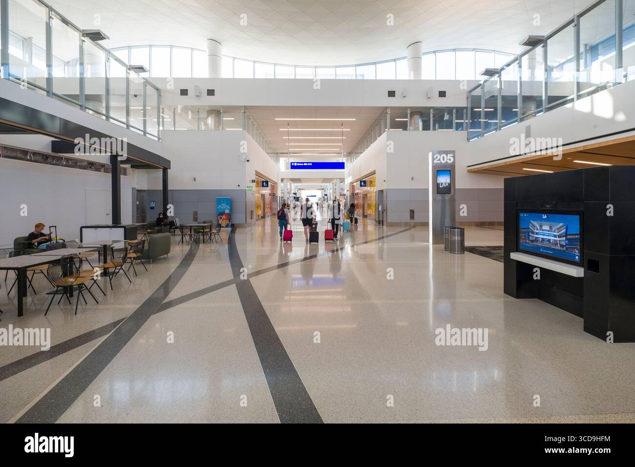 People walking in the concourse inside the West Gates at Tom Bradley ...