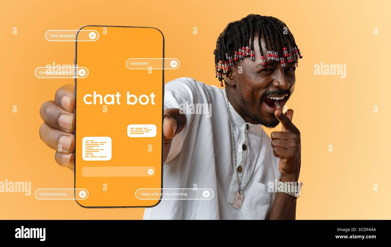 Engaging man showcasing chatbot features on smartphone against orange background in modern tech setup Stock Photo