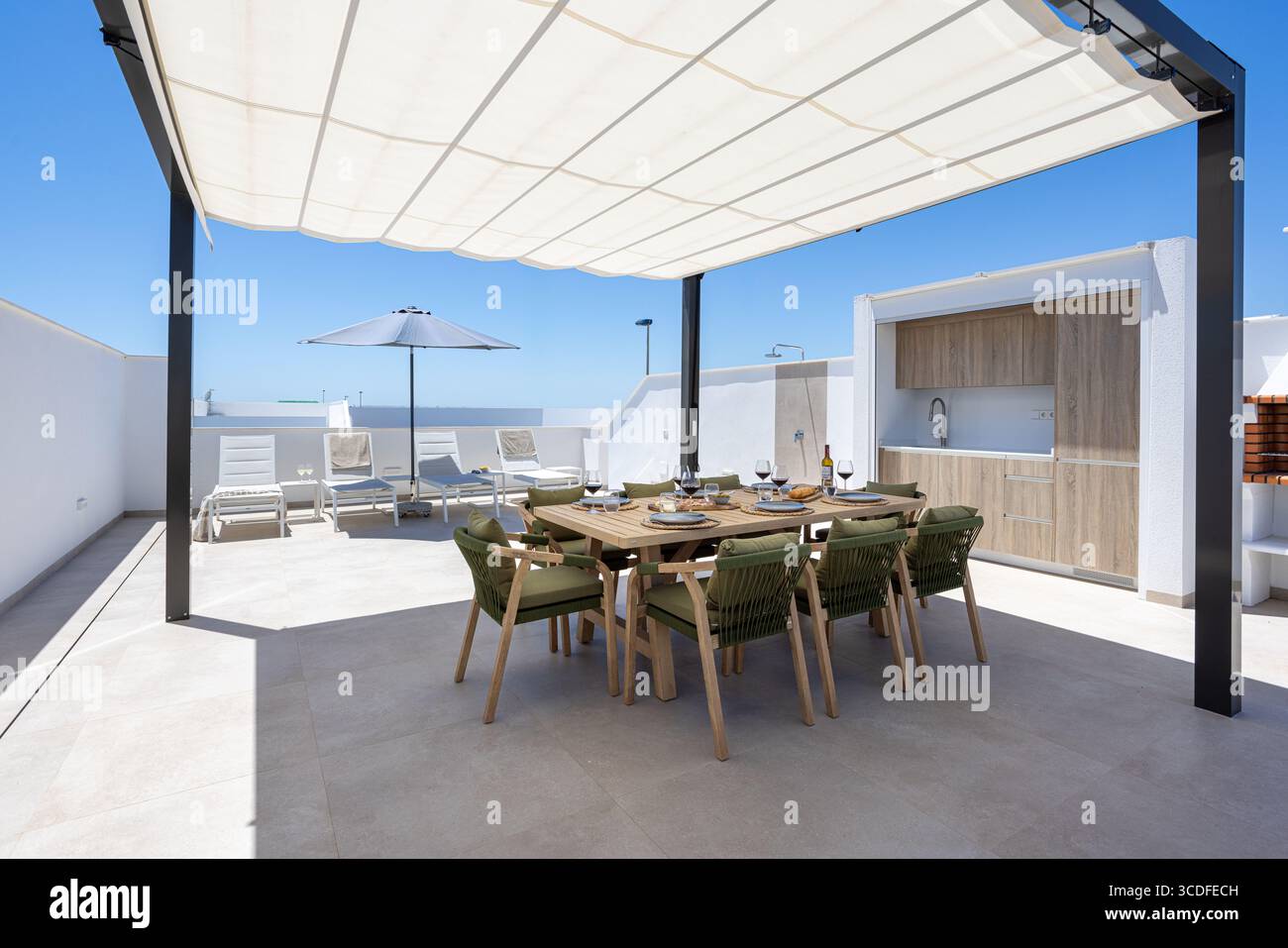 Spacious Rooftop Spacious rooftop terrace with shaded dining table, built-in kitchen ...