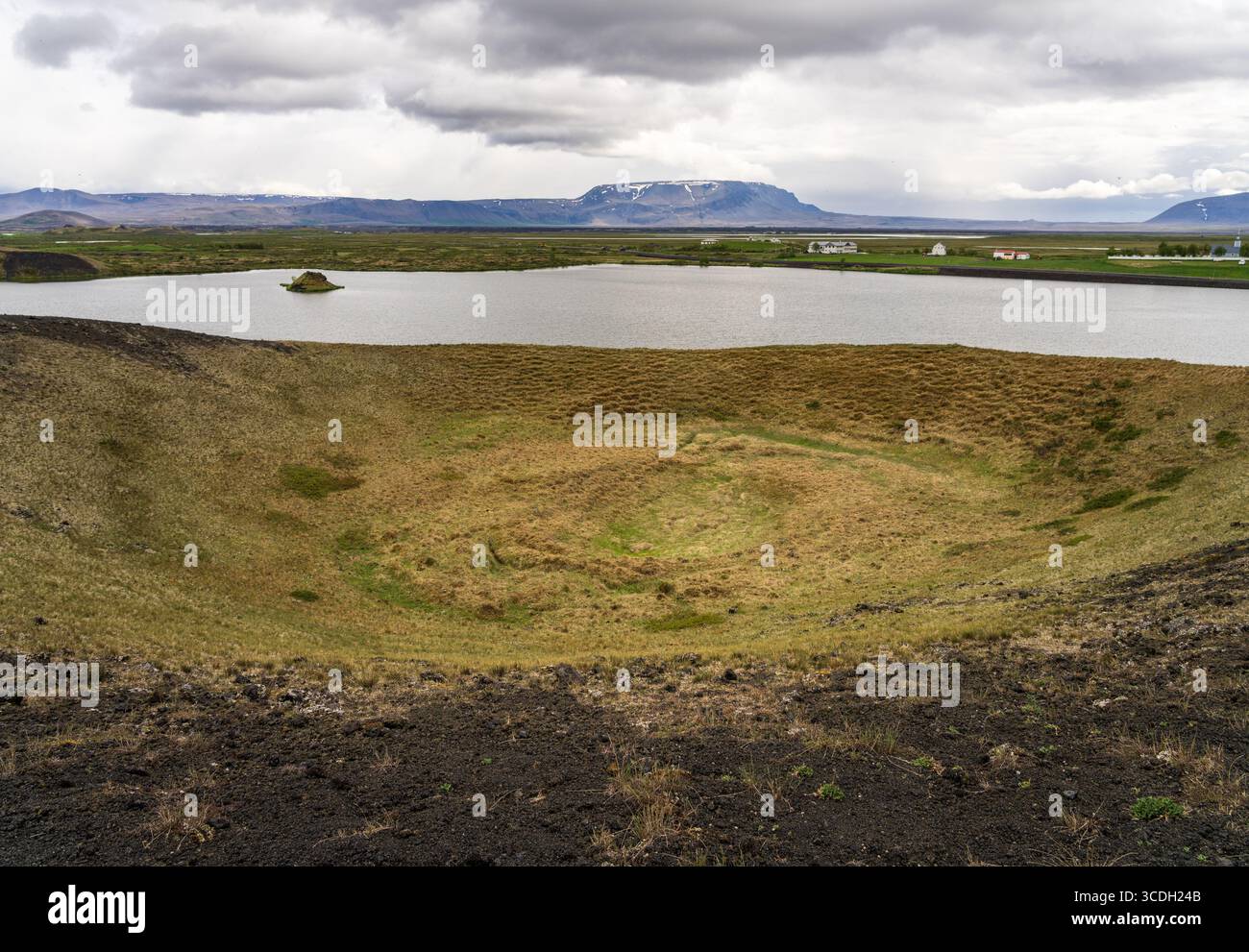 Explore the stunning landscapes of Lake Myvatn and its unique pseudo-craters in Iceland's Myvatn Nature Reserve Stock Photo