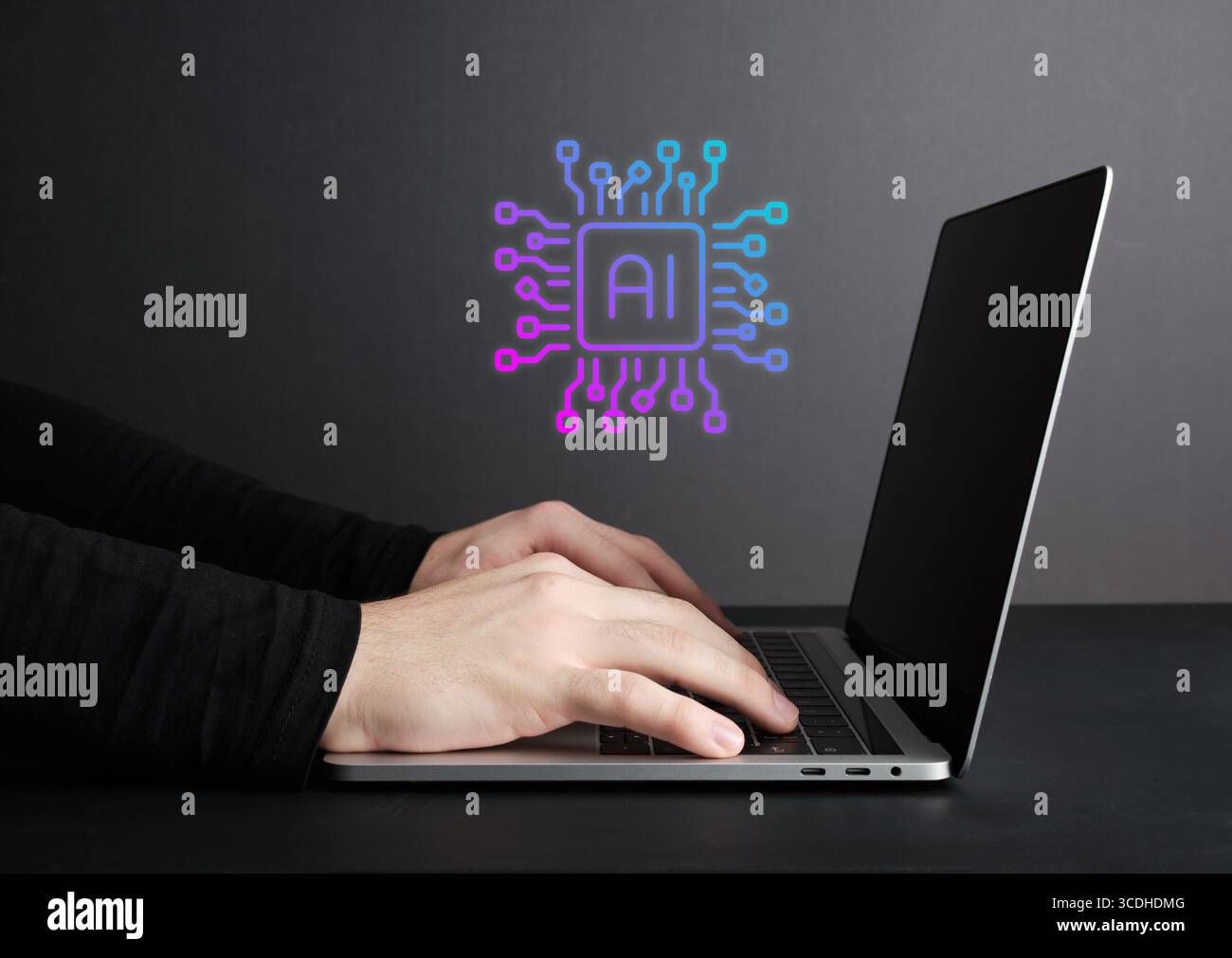 Software engineer working on a laptop is developing artificial intelligence using machine learning algorithms Stock Photo