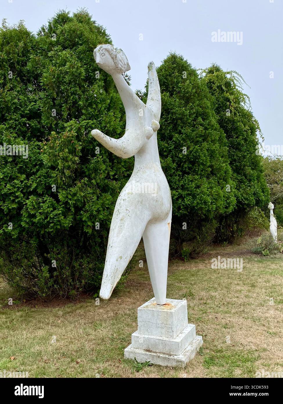 White sculpture of a dancine female figure by a local artist on Martha's Vineyard. - Smartphone Captured Stock Image