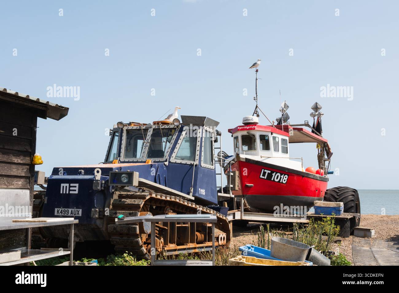 Fishing boats and lobster pots on Aldeburgh beach, a coastal town and civil parish in East Suffolk, England, UK Stock Photo