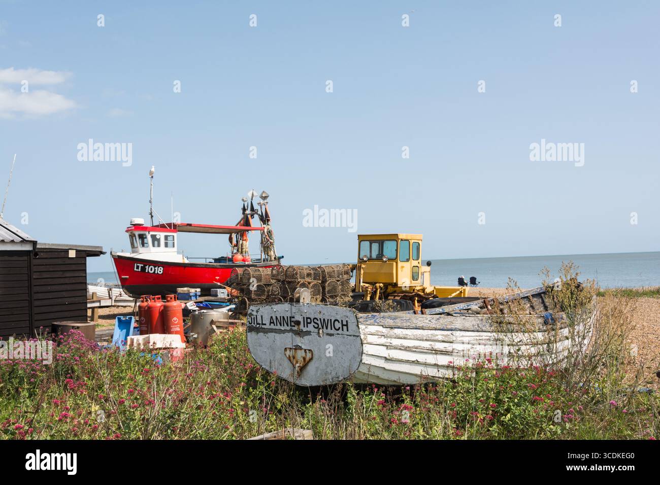 Fishing boats and lobster pots on Aldeburgh beach, a coastal town and civil parish in East Suffolk, England, UK Stock Photo