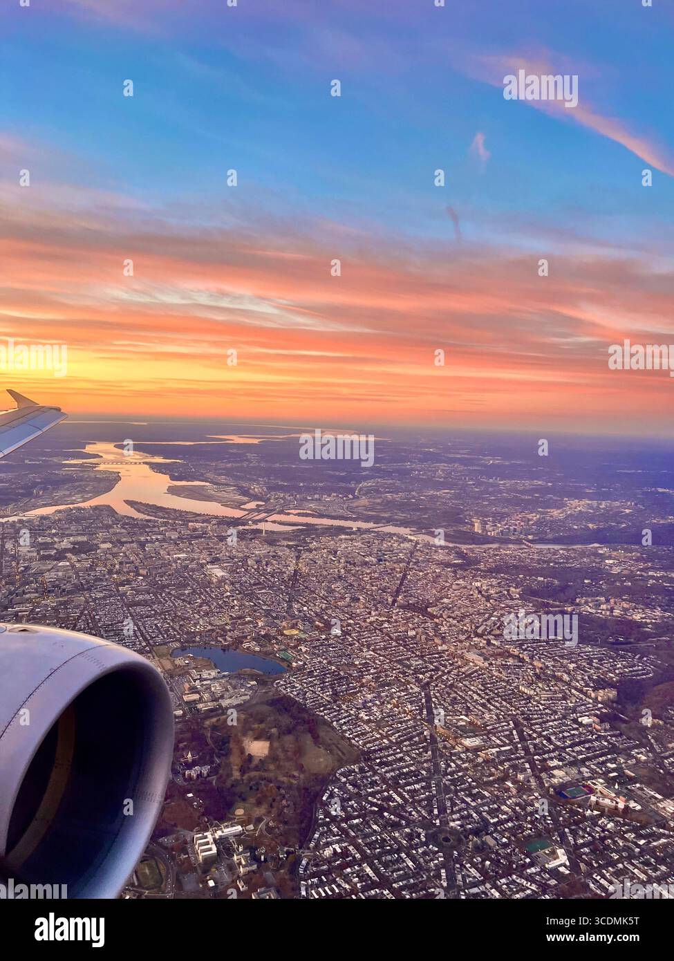 Aerial view looking south to the Potomac River separating Washington D.C. and Arlington, VA under a beautiful sunrise. - Smartphone Captured Stock Image