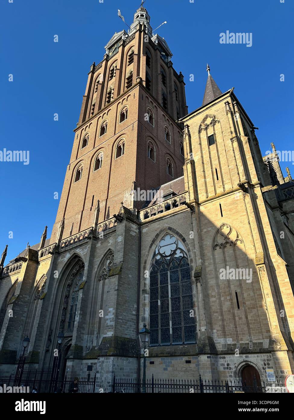 Historic Gothic Facade and Tower of Sint-Janskathedraal in Den Bosch, Netherlands - Smartphone Captured Stock Image