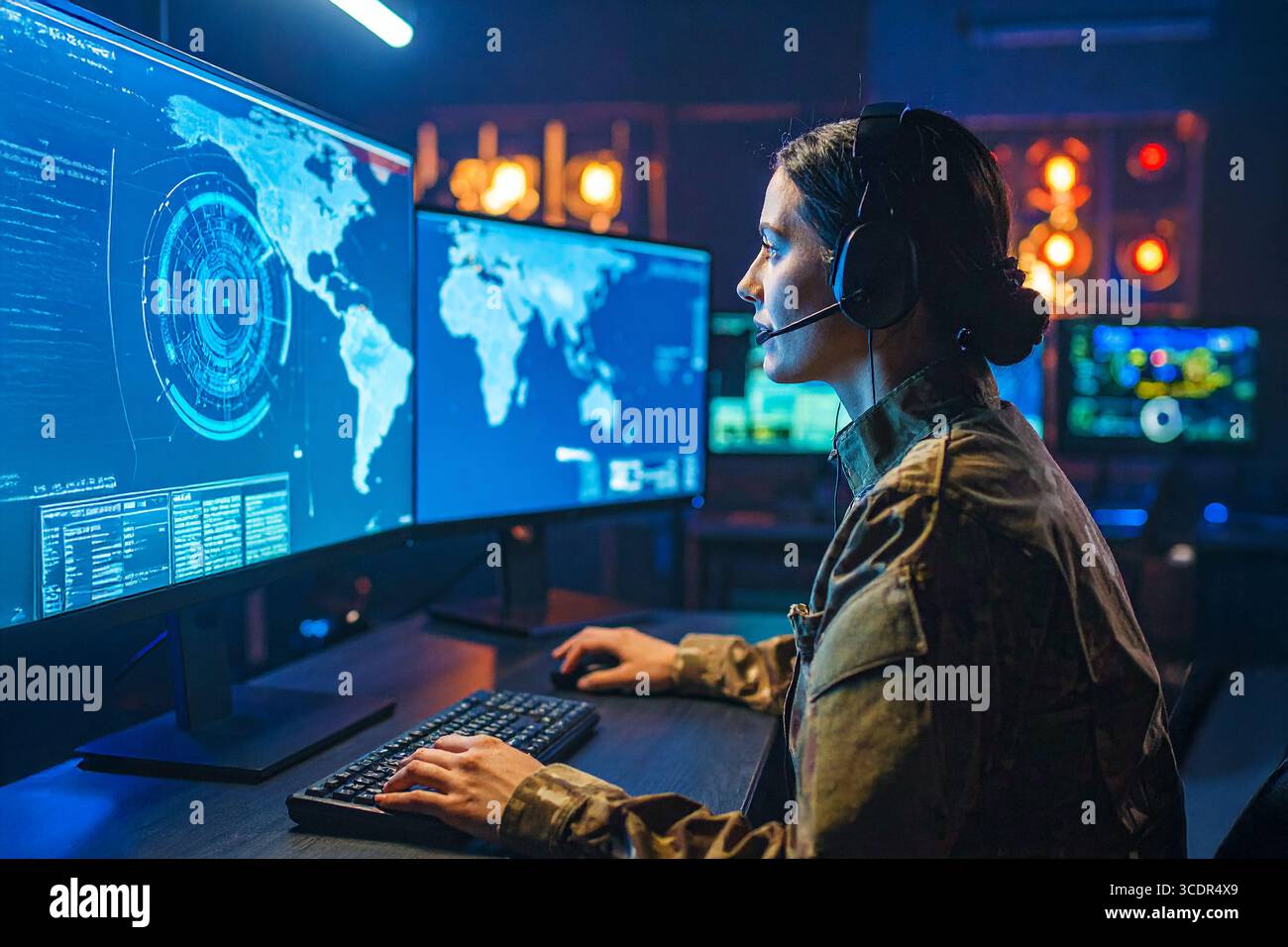 One of the series of photos : Military Analyst looking at large map screens with Stock Photo