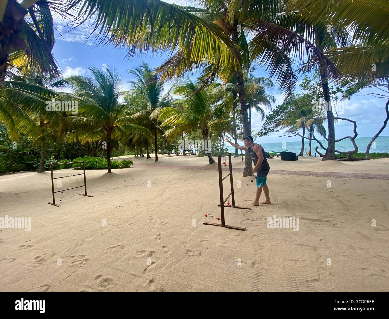 Beachside ladder ball game in Hopkins, Belize. - Smartphone Captured Stock Image