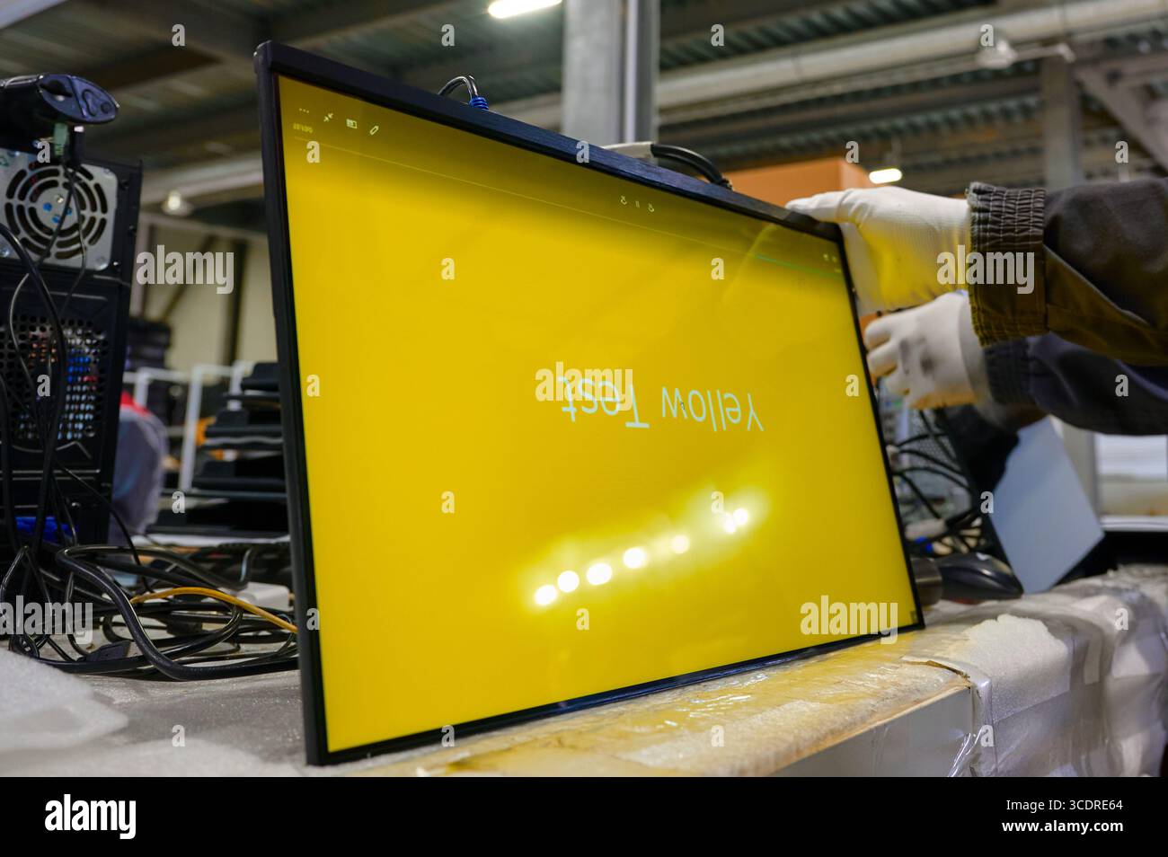 Monitor screen testing process inside an electronics manufacturing ...