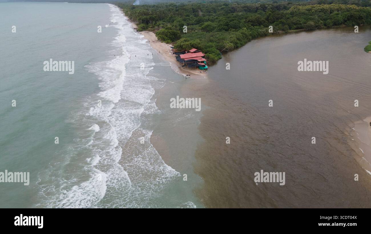 Stunning aerial view of Palomino beach with waves gently lapping the ...