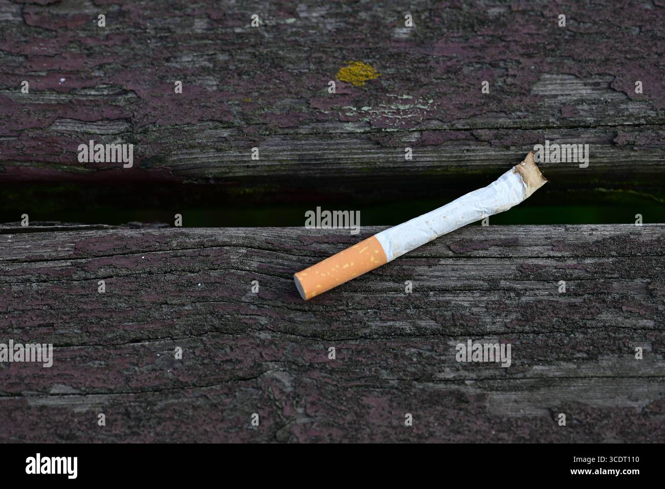 why tap a cigarette before lighting Why do people smack the box of cigarettes before opening it?