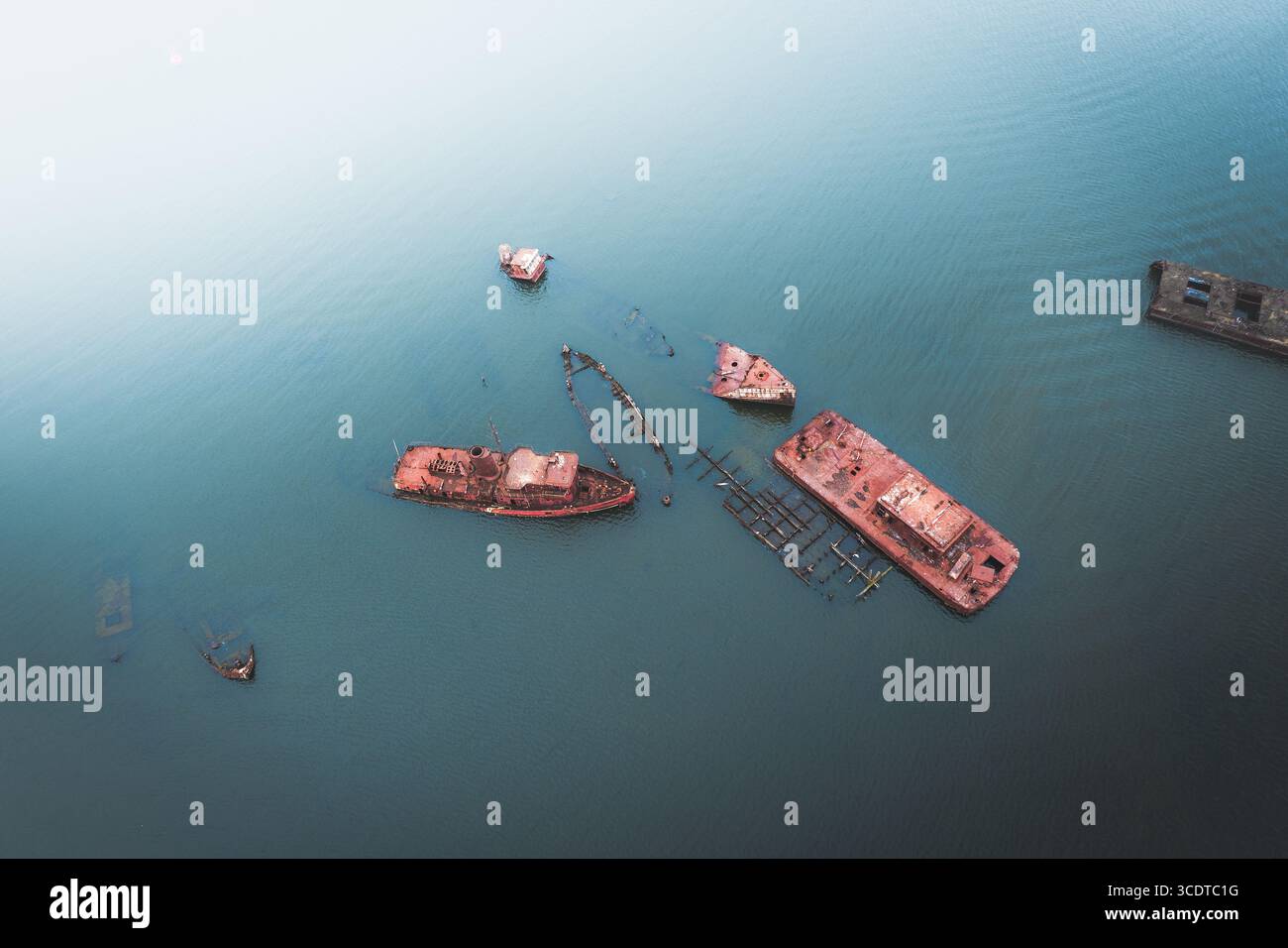 Aerial view of decaying shipwrecks scattered across the Arthur Kill ...