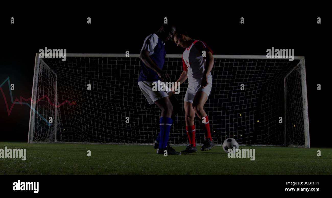 Two players contesting ball under hi-res stock photography and images ...