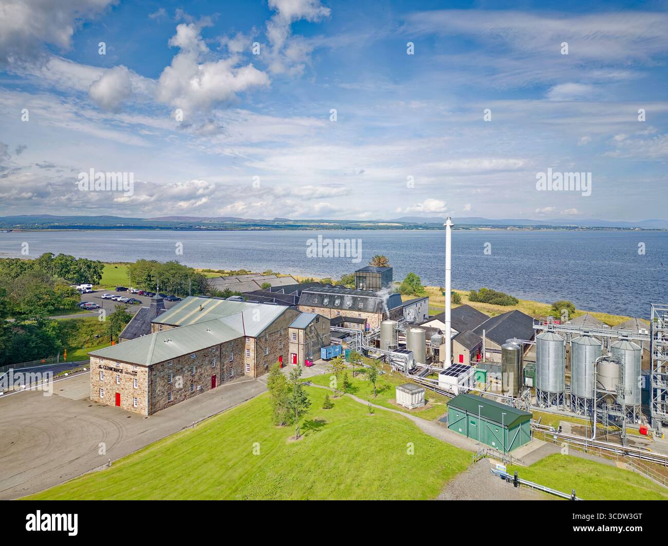 Glenmorangie distillery Tain Ross-shire Scotland blue sky over the buildings in summer Stock Photo