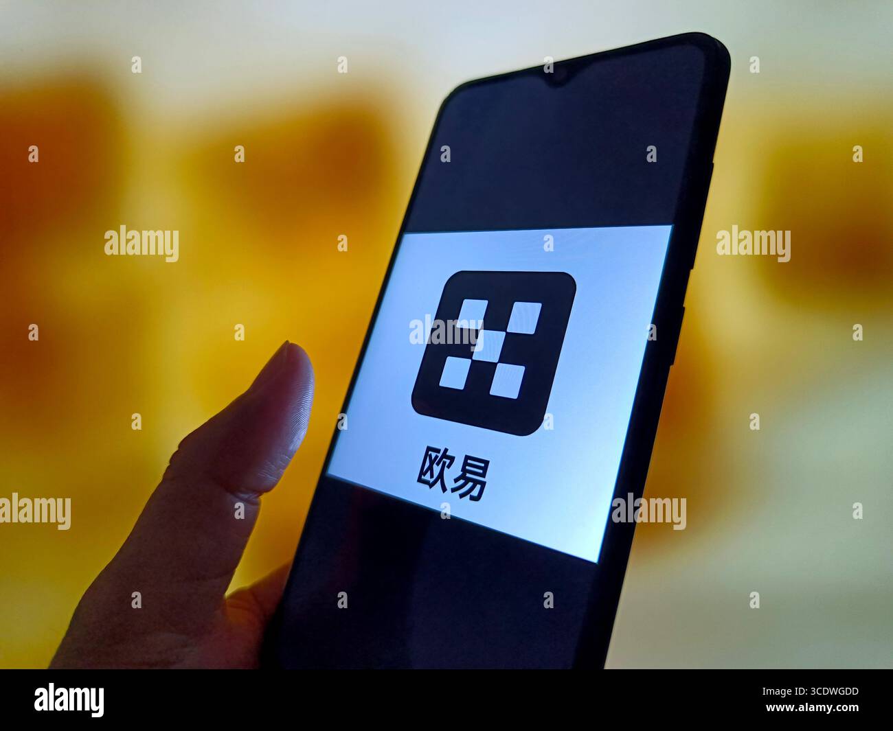 SUQIAN, CHINA - AUGUST 14, 2025 - A illustration photo shows OKX logo displayed in a smartphone in Suqian, Jiangsu Province, China on August 14, 2025. Stock Photo