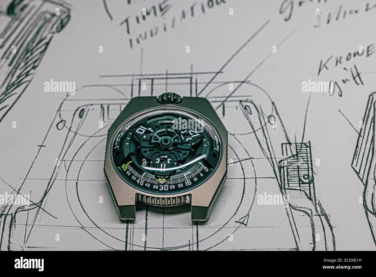 UR-100 timepiece with design sketch.  A spectacular timepieces from the Urwerk UR Satellite collection. Stock Photo