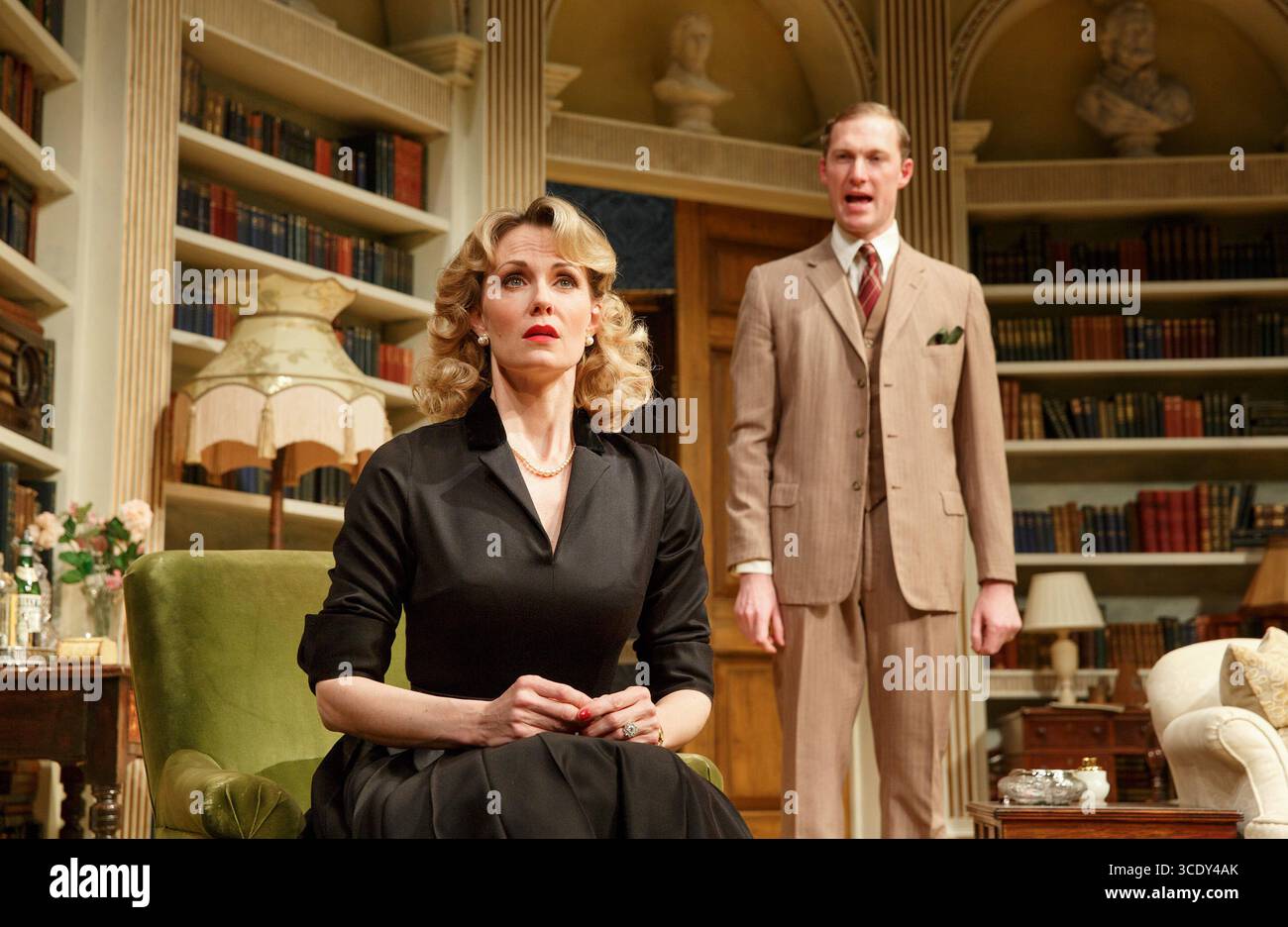 Leigh Zimmerman (Miranda Frayle), Sam Hoare (Nigel, Earl of Marshwood) in RELATIVE VALUES by Noel Coward at the Harold Pinter Theatre, London SW1  14/04/2014  a Theatre Royal Bath 2013 production  design: Stephen Brimson Lewis  lighting: Tim Mitchell  director: Trevor Nunn Stock Photo