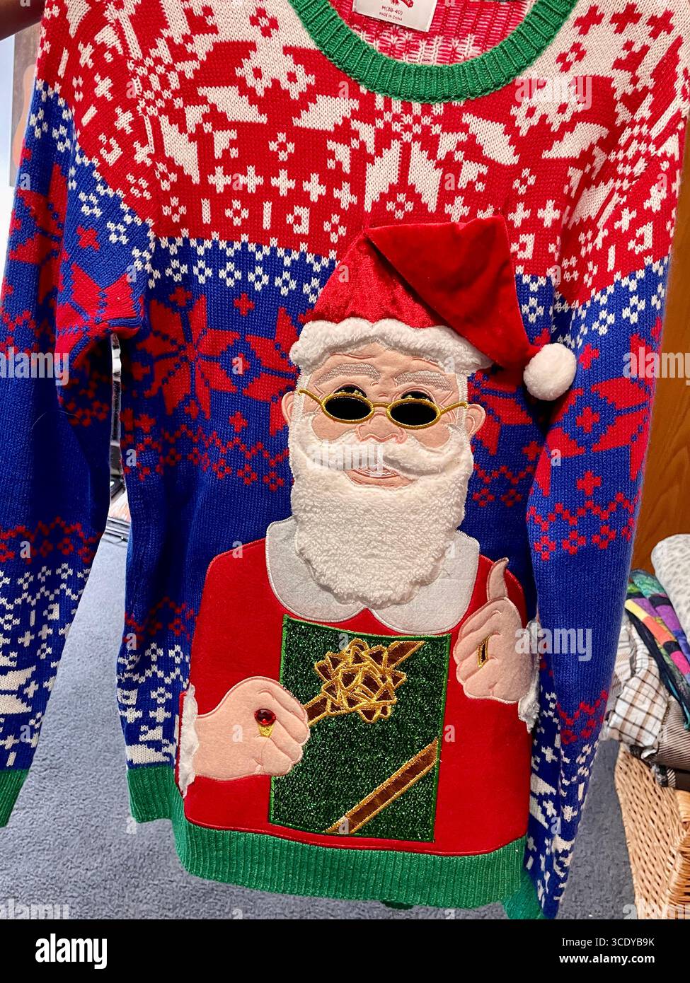 Close-up of an ugly Christmas sweater ready for a kitschy contest, United States, 2025 - Smartphone Captured Stock Image