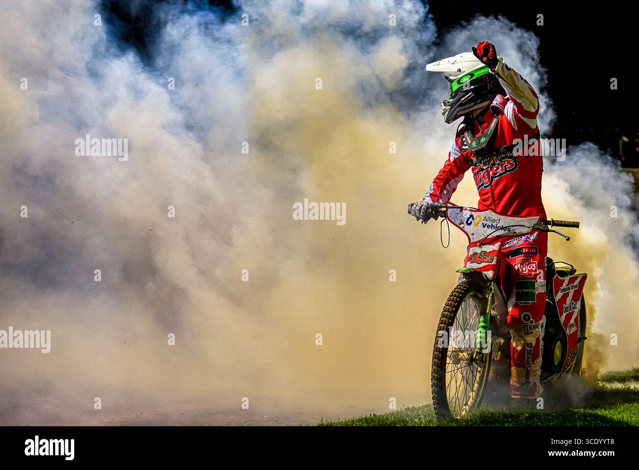 Speedway Rider Ben Basso Celebrates A Win For Glasgow Tigers With A Rear Tyre Burnout Spectacularly Filling The Air With White Smoke. Stock Photo