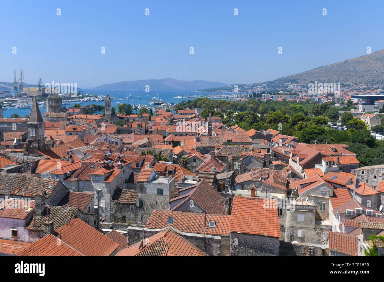 Trogir: Panoramic view of the Old Town and outskirts in the background from the Cathedral. Croatia. Stock Photo