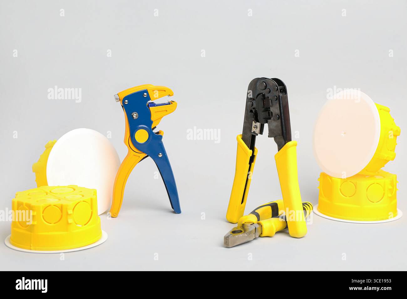 Electrician's tools on light background Stock Photo