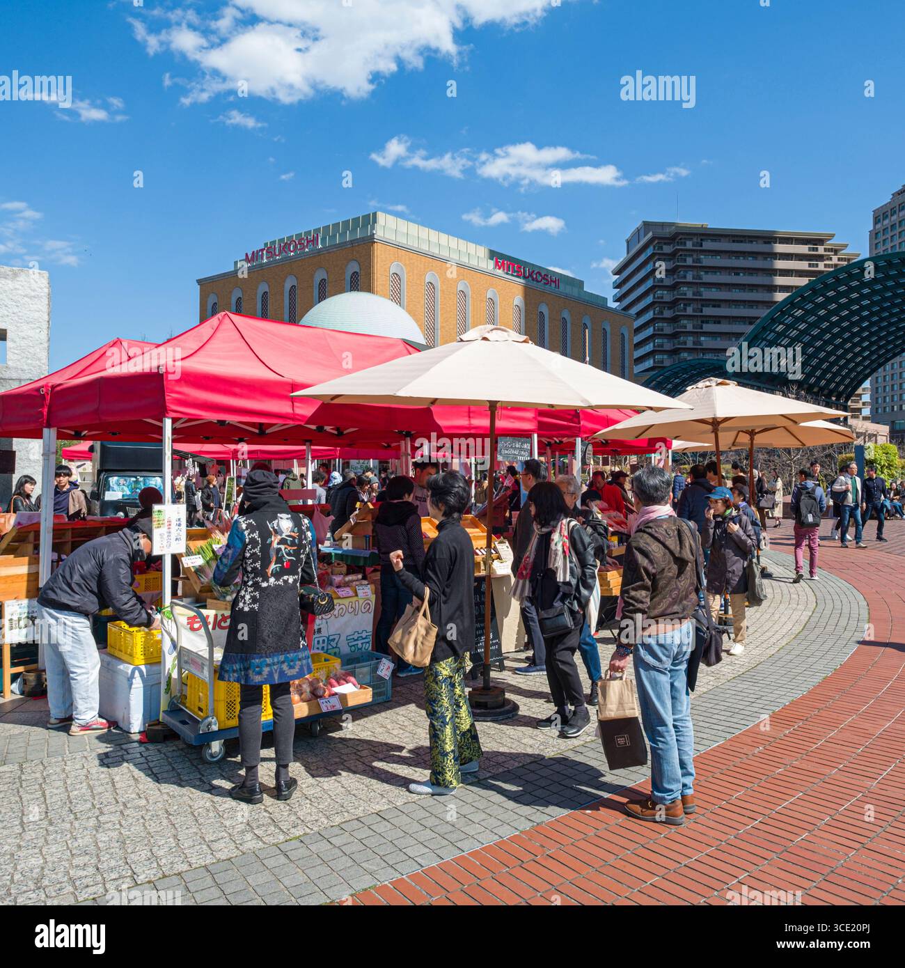 Vendors selling fresh produce from pop-up canopy shelters, Yebisu Garden Place, Shibuya-ku, Tokyo, Honshu, Japan Stock Photo