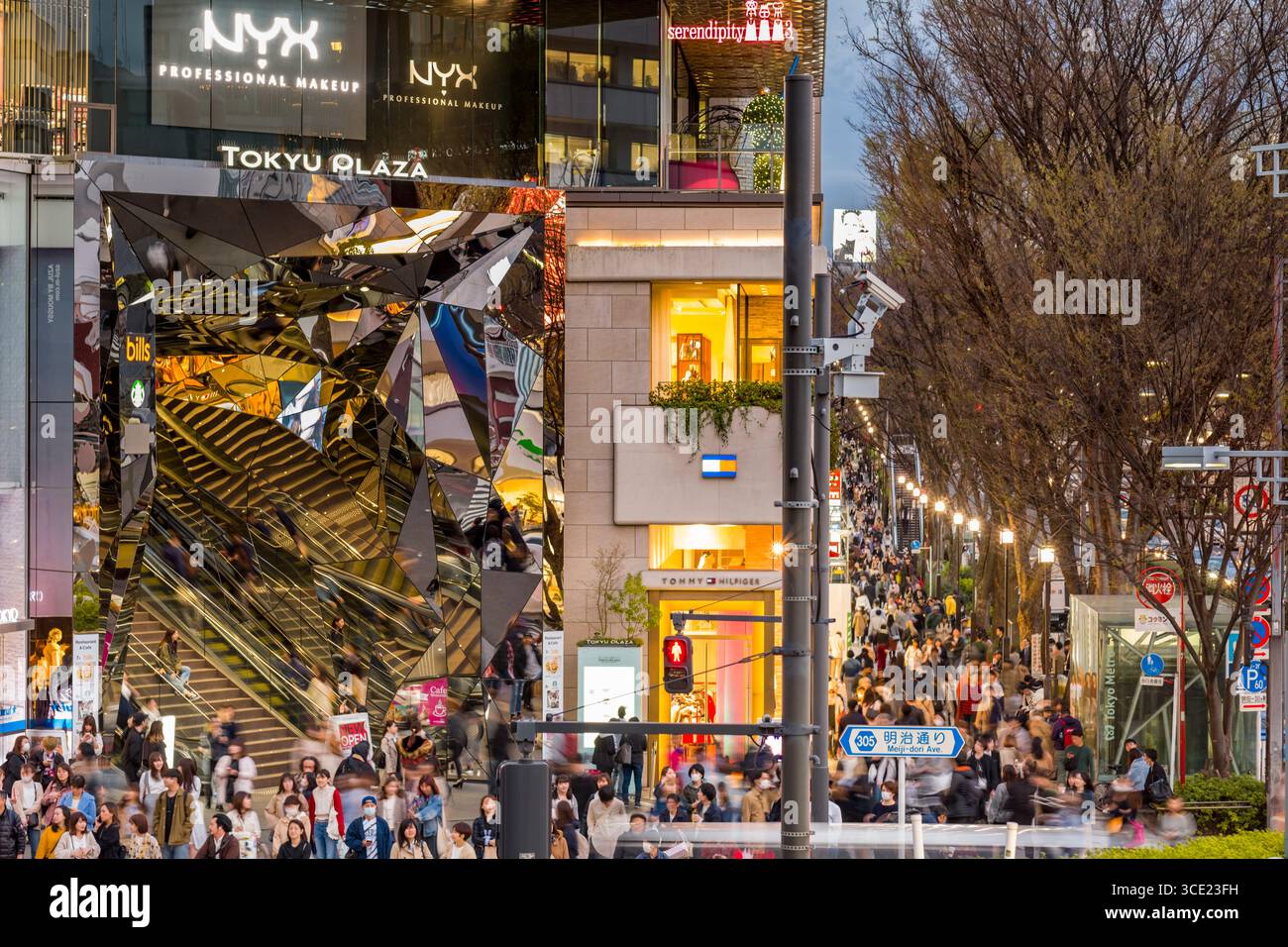 Multi-faceted mirror lined entrance to Tokyu Plaza on Meiji-dori Ave at  dusk, Harajuku, Jingūmae, Shibuya-ku, Tokyo, Honshu, Japan Stock Photo