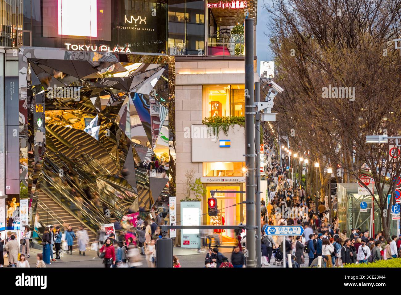 Multi-faceted mirror lined entrance to Tokyu Plaza on Meiji-dori Ave at  dusk, Harajuku, Jingūmae, Shibuya-ku, Tokyo, Honshu, Japan Stock Photo