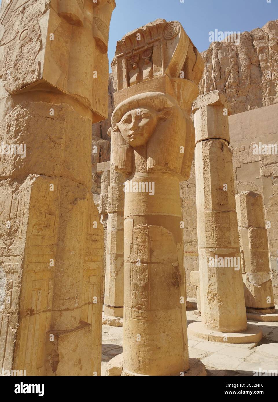 Temple of Hatshepsut, Luxor—freestanding mummy-style pillars in ancient Egyptian architecture, glowing in desert light. - Smartphone Captured Stock Image