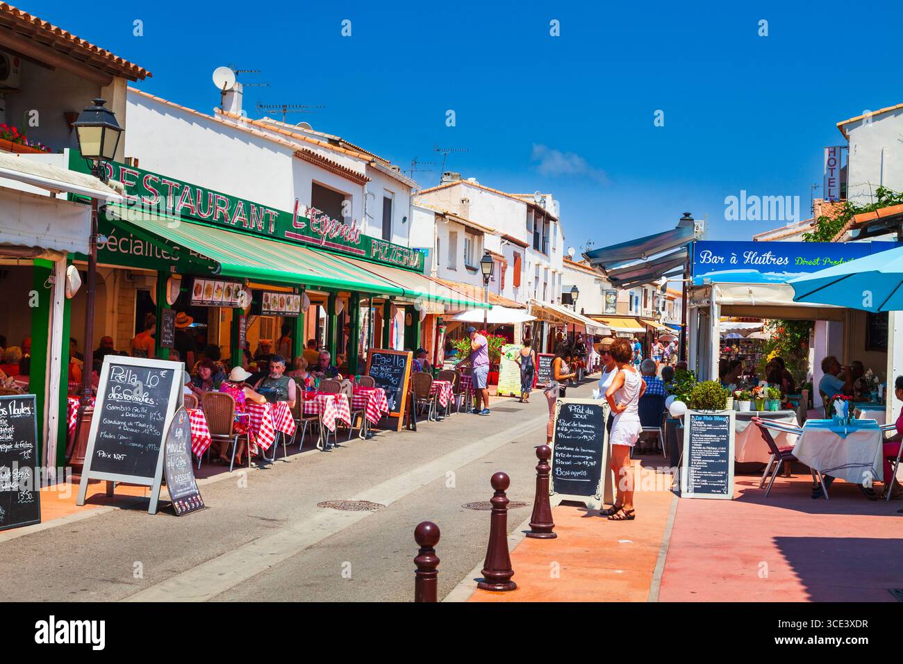 Tourists shops and restaurants in  Saintes-Maries-de-la-Mer in the Camargue France Stock Photo