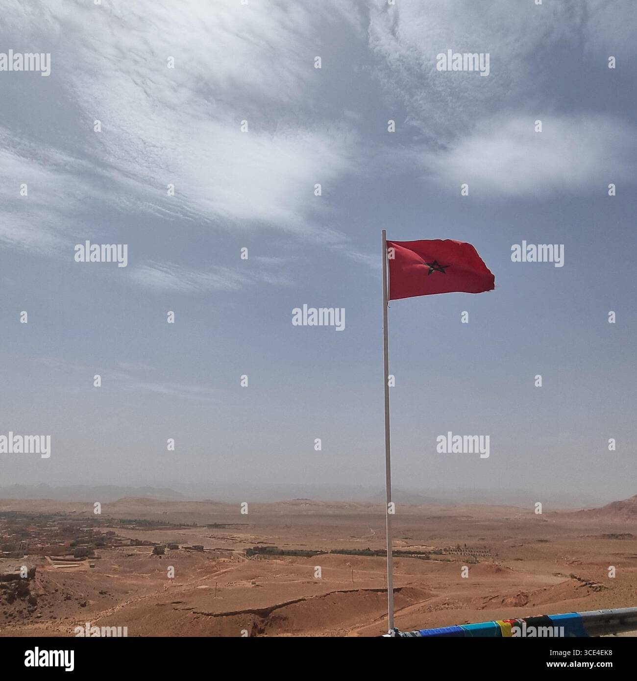 Flag flying in the wind in Dadès Gorge in Morocco - Smartphone Captured Stock Image Flag flying in the wind in Dadès Gorge in Morocco - Smartphone Captured Stock Image