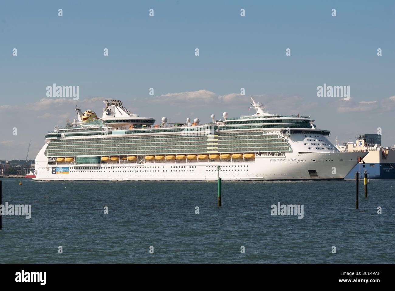 Southampton England UK. 14.07.2025. The cruise ship Independence of the Seas heading down Southampton Water southern England heading for open sea. Stock Photo