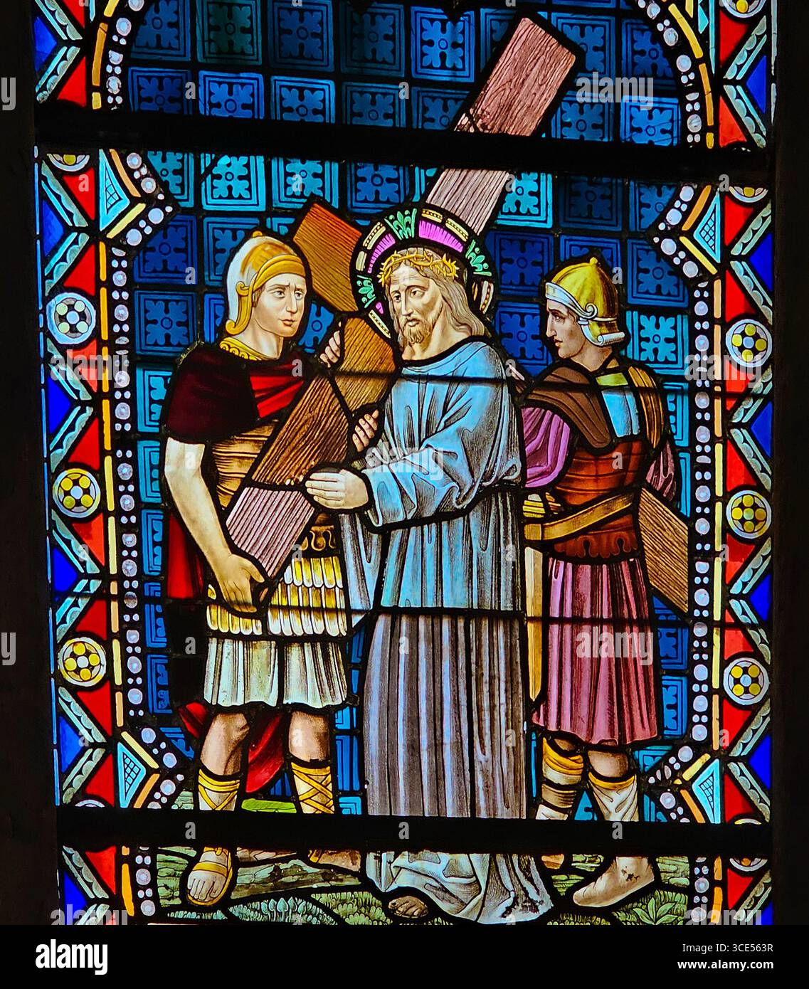 Rochefort, Belgium - July 23, 2025: Stained glass window showing Jesus ...