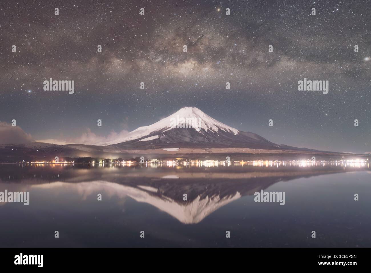 View of Mt Fuji at night across Lake Yamanaka, Yamanashi, Honshu, Japan Stock Photo