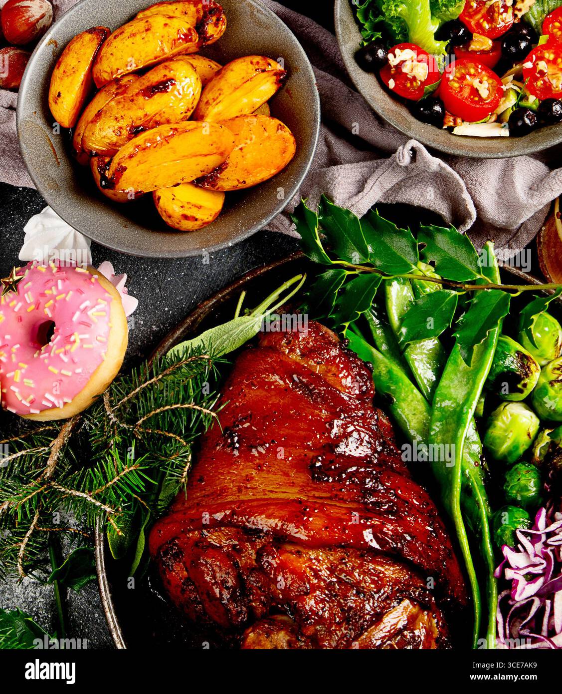 Christmas holidays table setting concept on dark background. View from above Stock Photo
