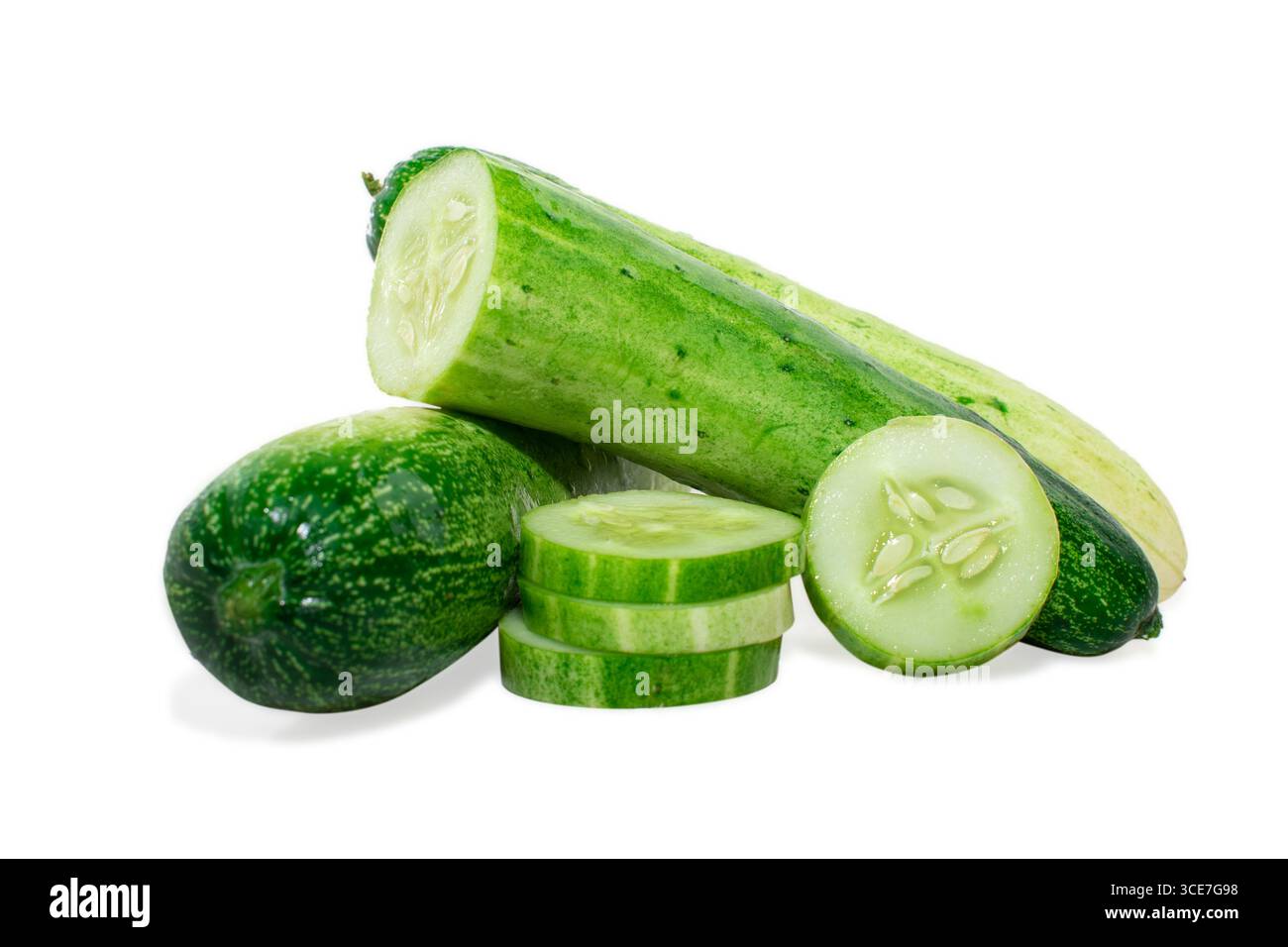 Cucumber and slices isolated on white background. Stock Photo
