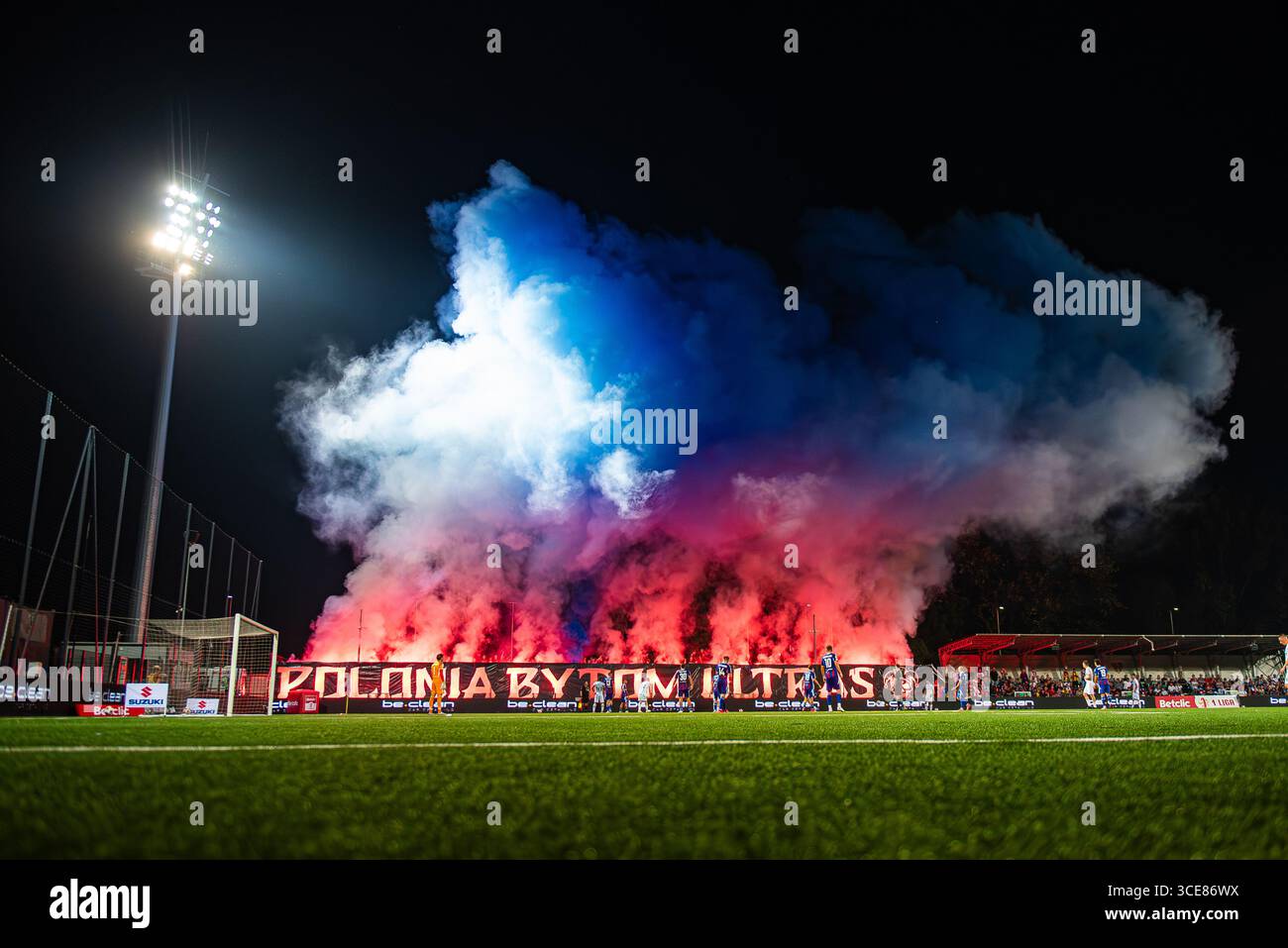 BYTOM, POLAND – AUGUST 9, 2025: Betclic 1 Liga match Polonia Bytom vs Stal Rzeszów. Pyro of Polonia fans. Stock Photo