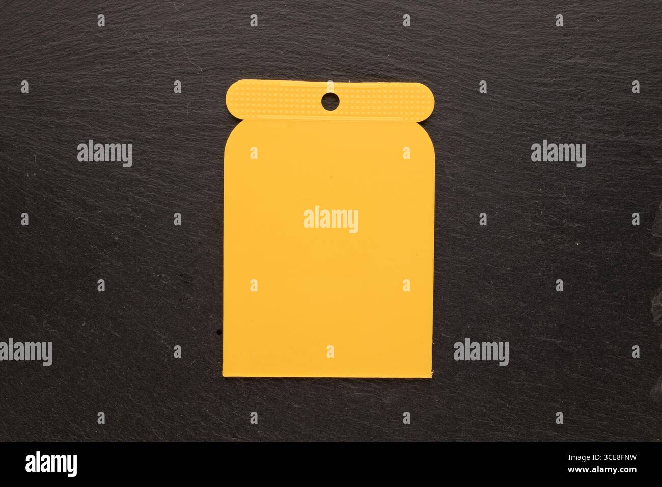 Set of plastic spatulas for applying putty, macro, top view Stock Photo ...