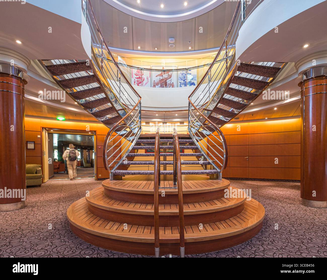 Ornate staircase in the atrium aboard the Regent Seven Seas Mariner ...