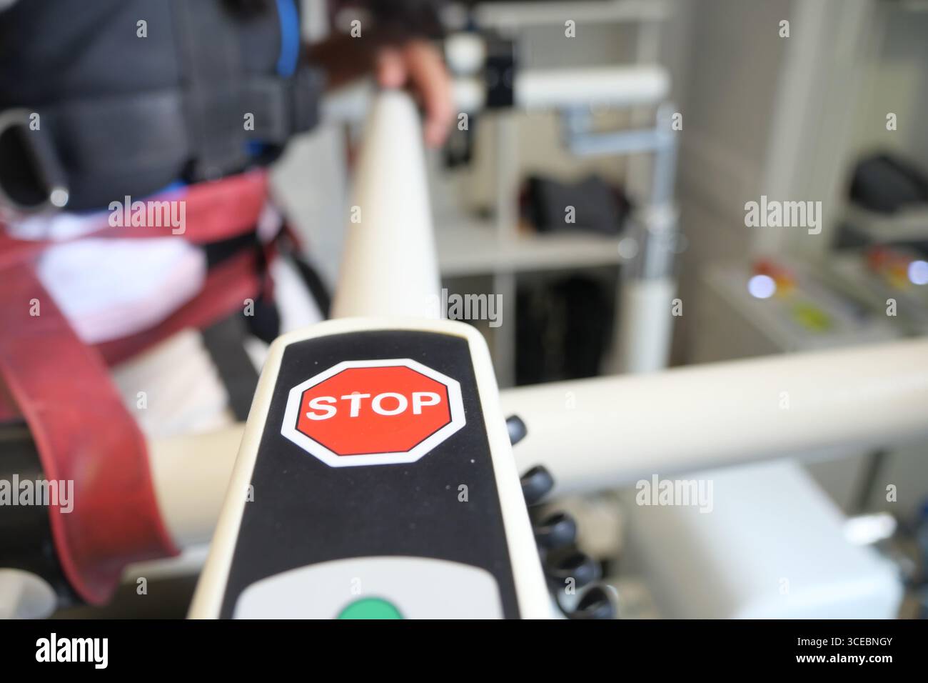 Control panel with stop button in a training facility Stock Photo - Alamy