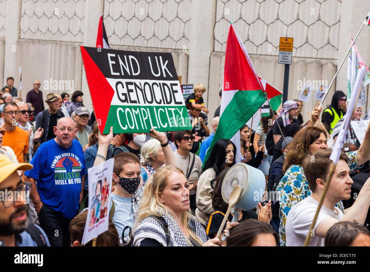 Leeds, UK. 16 AUG, 2025. Person holds a sign reading 