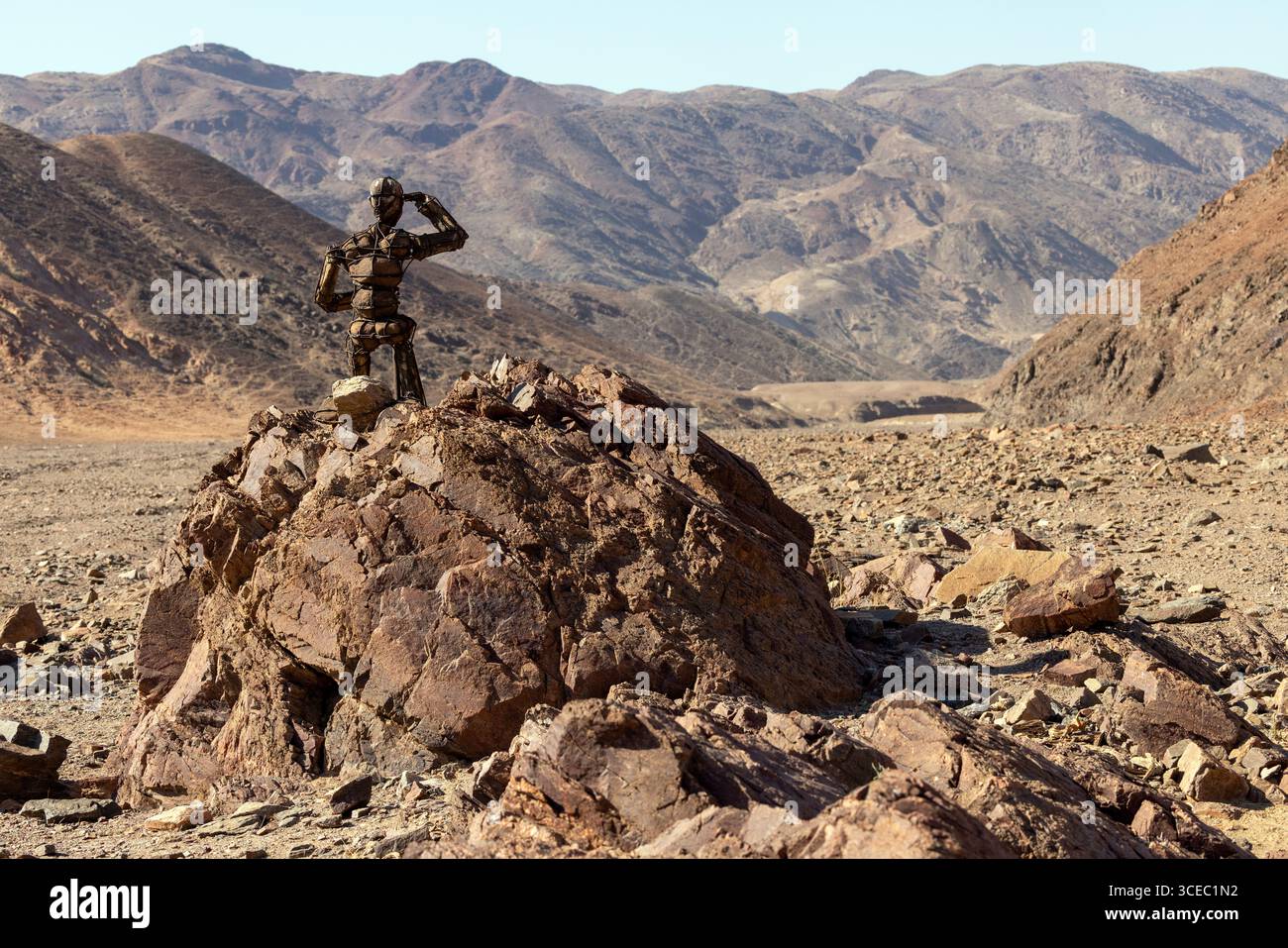 One of many "Lone Stone Men" sculptures by artist RENN in the Namib Desert - Kaokoland region, Namibia, Africa Stock Photo